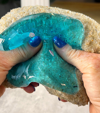 Coastal Castle 6 oz. sand slime, 2 oz. coated clear and 1 oz. thick and glossy